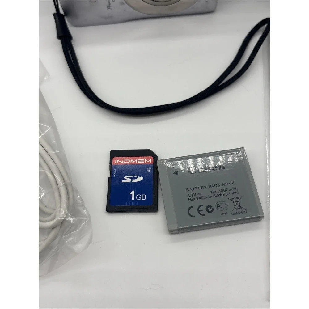 Canon PowerShot SD1300 IS 12.1MP Digital Camera Bundle Battery Charger SD Tested
